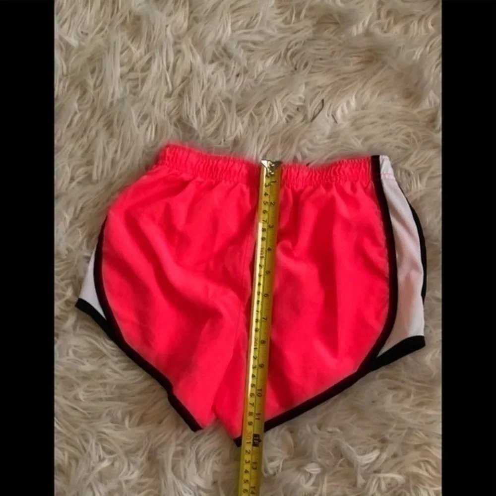 Nike pink running shorts sz med